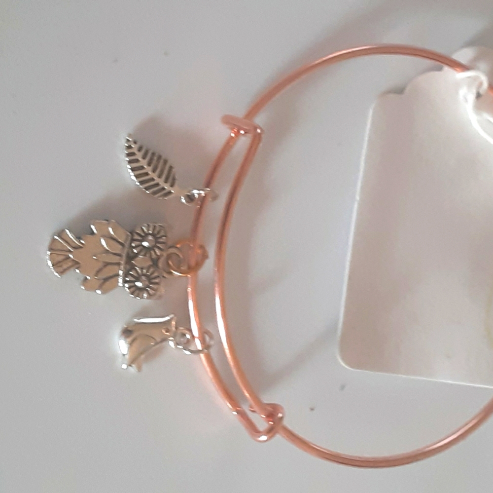 Adjustable bangle bracelet with charms